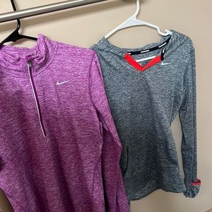 Two Nike running long sleeves